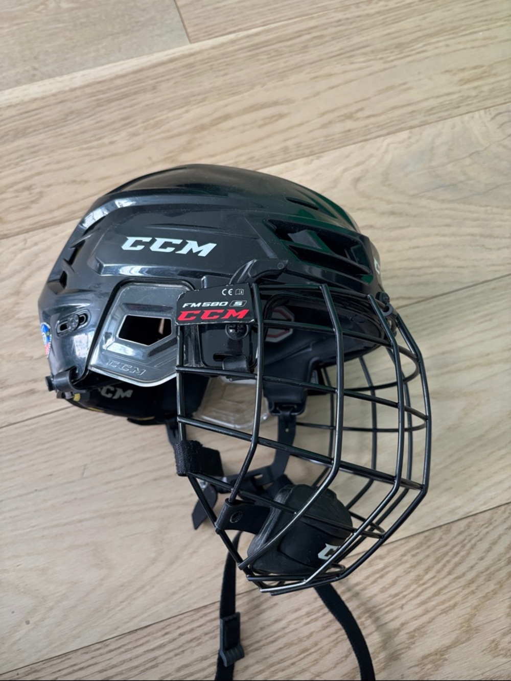CCM Black Hockey Helmet with Black Wire Cage